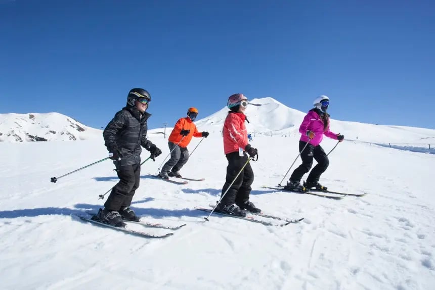 4 people skiing in Chile